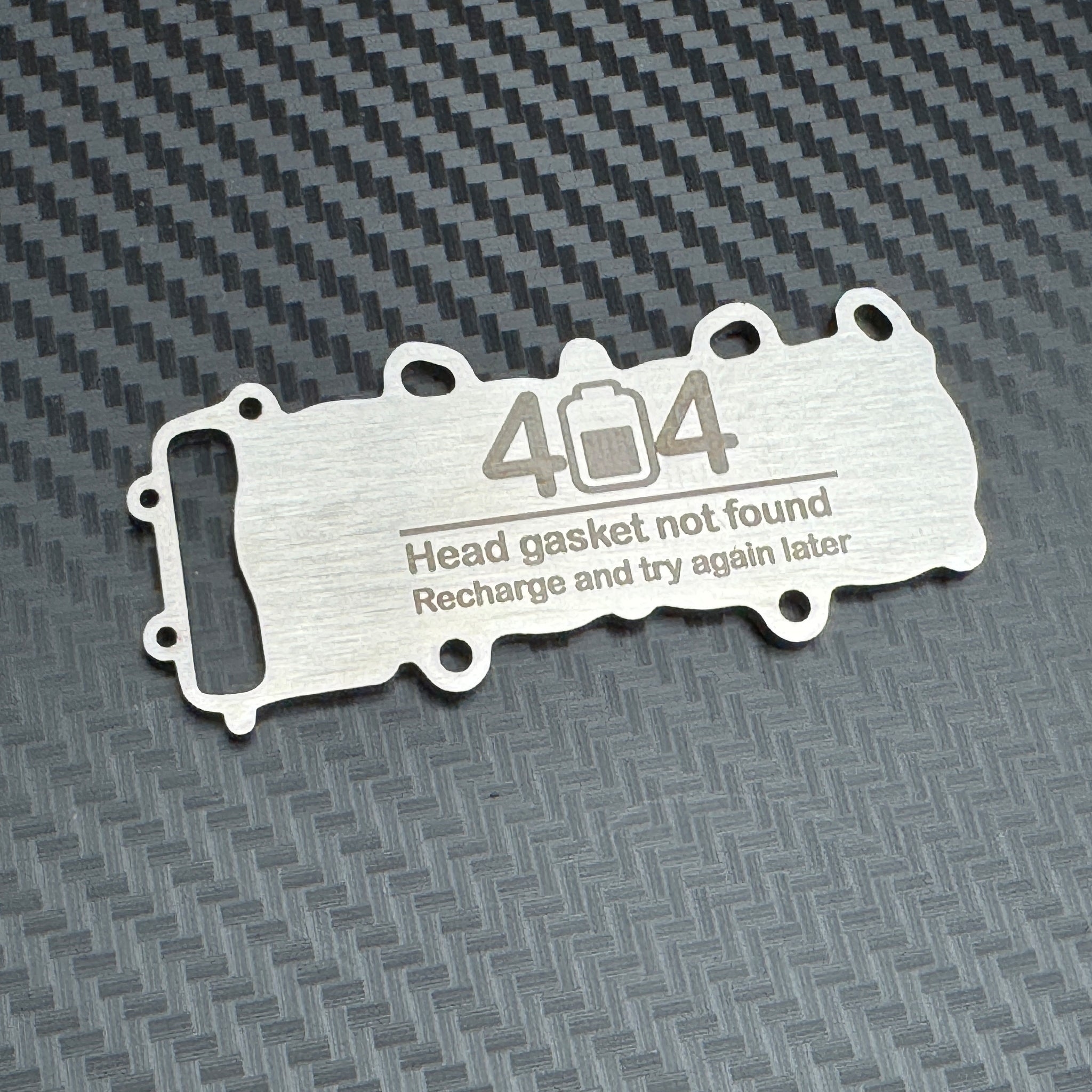 Electric car head gasket keychain prank