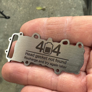 Electric car head gasket keychain prank